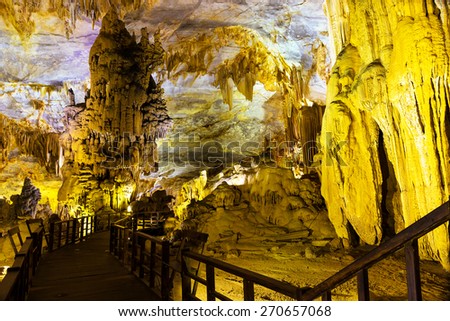 QUANGBINH, VIETNAM - March 14, 2015: THIEN DUONG - famous cave in Quang Binh, Vietnam under multi-colored lights. This is one of the most beautiful caves in Vietnam.