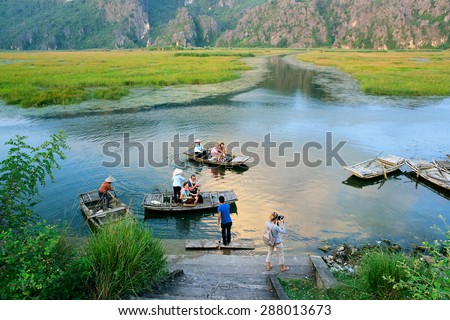 VANLONG, Ninh Binh November 22, 2014: tourists in the lagoon VANLONG. VANLONG Lagoon is a nature reserve in the province of Ninh Binh, VIETNAM.