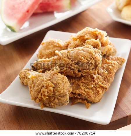 fried chicken and watermelon closeup - stock photo