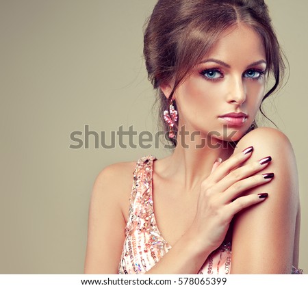 https://thumb1.shutterstock.com/display_pic_with_logo/1054231/578065399/stock-photo-beautiful-model-girl-with-pink-metallic-manicure-on-nails-fashion-makeup-and-cosmetics-pink-578065399.jpg