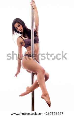 stock-photo-beautiful-young-woman-exercise-pole-dance-against-a-white-background-studio-shot-267576227.jpg