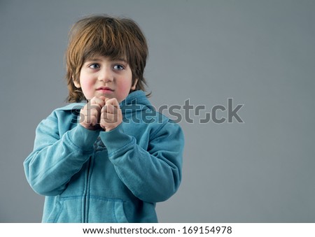 Beautiful kid having a thought isolated