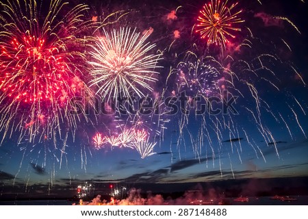 colorful fireworks on the black sky background over-water