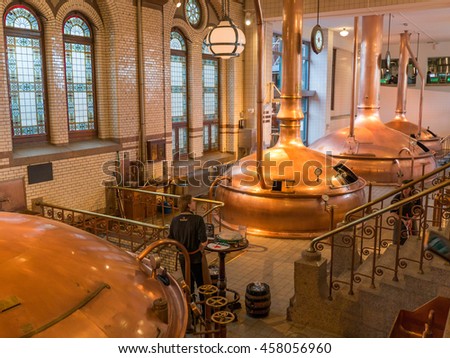 Amsterdam, The Netherlands, April 2016 : The Heineken Experience is a historic brewery and corporate visitor center for the internationally distributed Dutch pilsner, Heineken beer.