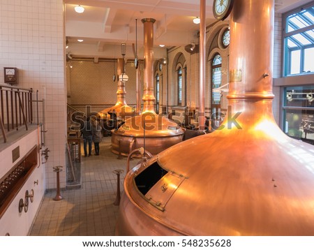Amsterdam, The Netherlands, April 2016 : The Heineken Experience is a historic brewery and corporate visitor center for the internationally distributed Dutch pilsner, Heineken beer.