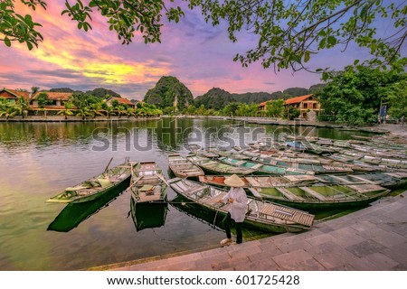 Rowing boat Waiting for passengers at sunrise,Hoa Lu Tam Coc,Hoi An Ancient Town,Vietnam.