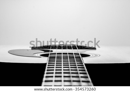 Guitar Strings, close up. Acoustic guitar. Black and white photography.