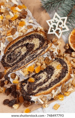 Homemade Poppy Seeds Cake And Spruce Branches On Rustic Board Dessert Decoration For Christmas Homemade Poppy Seeds Cake And Spruce Branches On Rustic Board Dessert Decoration For Christmas