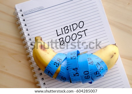 stock-photo-banana-with-blue-measuring-tape-notebook-with-text-libido-boost-men-s-health-concept-604285007.jpg