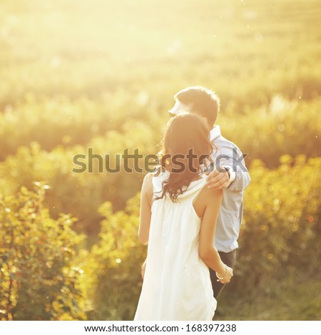 https://thumb1.shutterstock.com/display_pic_with_logo/1143296/168397238/stock-photo-young-couple-having-date-spending-great-time-together-in-garden-168397238.jpg