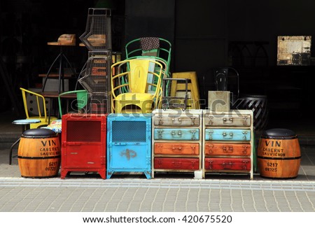 Vintage furniture and other staff at entry to shop at Jaffa flea market district in Tel Aviv-Jaffa, Israel.