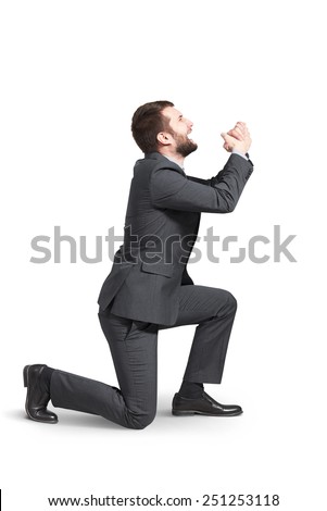 crying man standing on one knee and apologizing. isolated on white ...