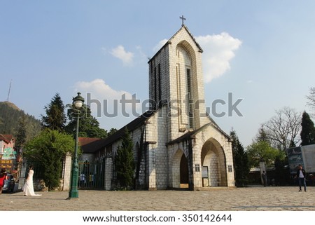 SAPA, LAO CAI, VIETNAM - The Catholic Holy Rosary church and main square in Sapa, Lao Cai, Vietnam. Sapa is town at Hoang Lien Son Mountains of northwest Vietnam