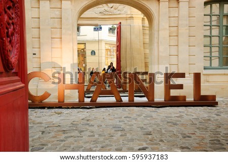 PARIS, FRANCE - JANUARY 28, 2017: Chanel shop in old Marais quarter. Chanel fashion house founded by Coco Chanel is symbol of haute couture and luxury goods.