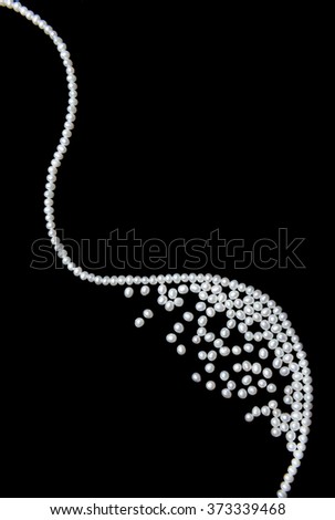beautiful pearls on black background