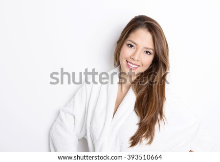 https://thumb1.shutterstock.com/display_pic_with_logo/122137/393510664/stock-photo-beautiful-young-asian-woman-with-flawless-skin-and-long-hair-posing-in-bath-robe-393510664.jpg