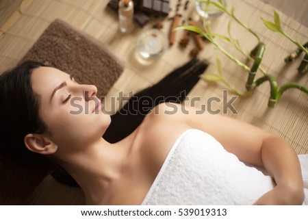 Spa Woman. Beautiful Woman Relaxing in Spa Salon. High quality image