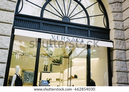 BERLIN, GERMANY - MAY 11, 2017: Versace fashion company brand trademark logo on store front at famous Kurfuerstendamm in Berlin Charlottenburg.