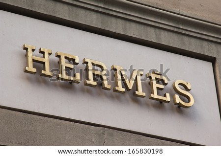 Florence, ITALY - December 8, 2011: Hermes Florence Store Logo Italy mounted on the marble wall of Hermes Store at Via de' Tornabuoni, the heart of Florence high-class shopping district