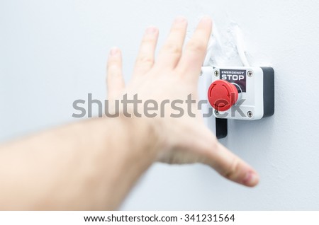 stock-photo-emergency-red-stop-button-activated-by-male-hand-341231564.jpg