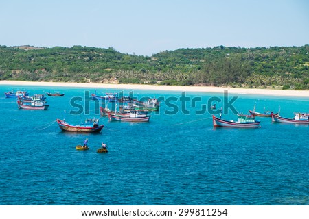 PHU YEN, VIETNAM, June 12, 2015. Fishers on boats in the sea near Ganh Da Dia. Ganh Da Dia is a famous travel place in middle of Vietnam.