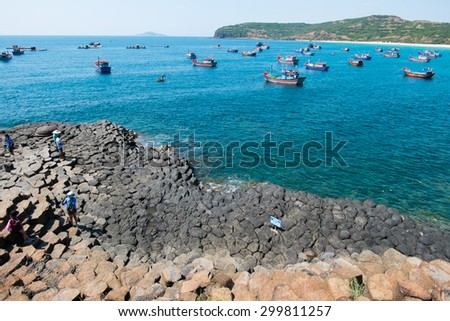 PHU YEN, VIETNAM, June 12, 2015. Fishers on boats in the sea near Ganh Da Dia. Ganh Da Dia is a famous travel place in middle of Vietnam.