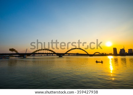 DANANG, VIETNAM - JANUARY 4, 2016: Dragon River Bridge ( Rong Bridge) in sunset in Da Nang, Vietnam.