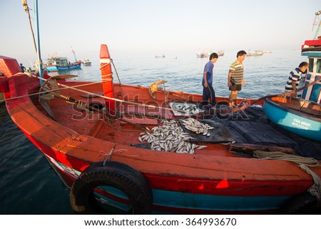 LYSON, VIETNAM - JANUARY 4, 2016: Fisher men on the boat after journey in Ly Son island in Quang Ngai, Vietnam.