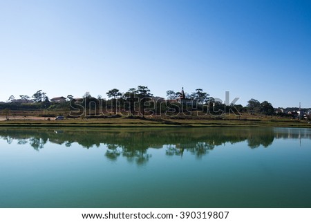 DALAT, VIETNAM - MARCH 4, 2016: Lanscape near by Xuan Huong Lake. This artificial lake in the city centre is a favourite place for tourists and locals for walking.