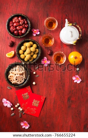 Flat Lay Chinese New Year Food And Drink Still Life On Red Wooden Rustic Background Flat Lay Chinese New Year Food And Drink Still Life On Red Wooden Rustic Background