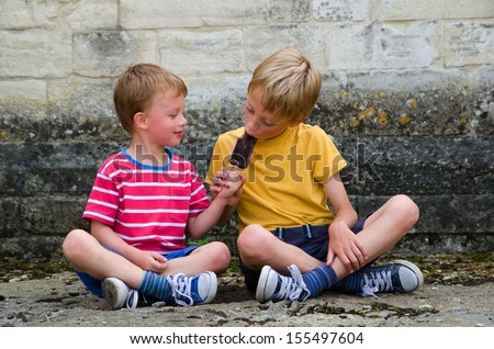 Kids Sharing Stock Photos, Images, & Pictures | Shutterstock