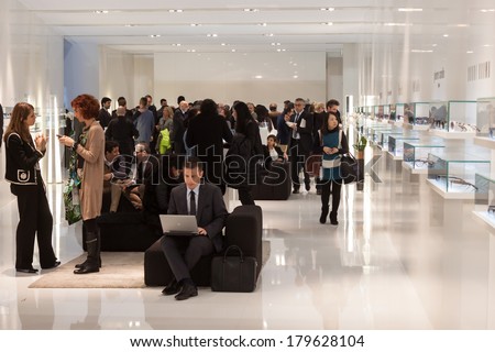 MILAN, ITALY - MARCH 1: People visit Mido, international exhibition for optics, optometry and ophthalmology on MARCH 1, 2014 in Milan.