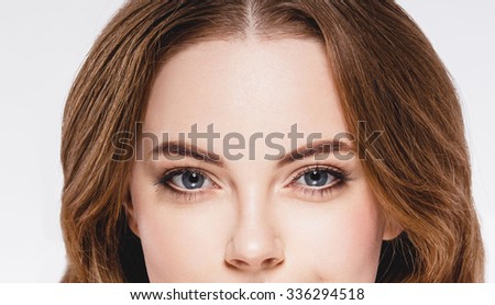 Eyes Beautiful woman face close up portrait young studio on white