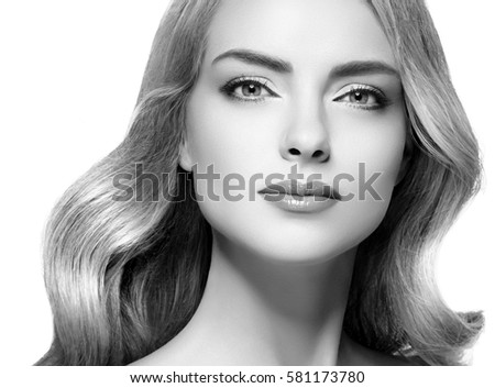 Beautiful woman face close up studio on white black and white Beautiful woman face close up studio on white black and white