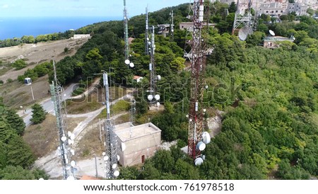 Aerial photo of radio masts and towers structures designed to support antennas also known as aerials for telecommunications and radio and television broadcasting and for example cell phones
