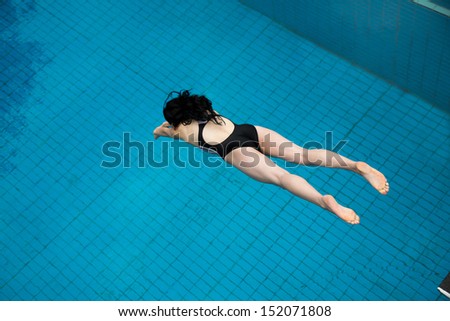 Public Swimming Pools With Diving Boards woman jumping diving board public swimming stock photo 152073395 Public Swimming Pools With Diving Boards woman jumping diving board public swimming stock photo 152073395