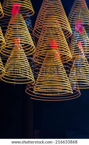 Incense coils hang in the Chinese congregation hall temple