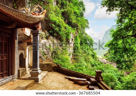 Scenic view from the Bich Dong Pagoda at Ninh Binh Province in Vietnam. Ancient Buddhist cave temple is a popular tourist destination of Asia