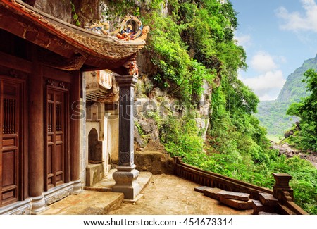 Scenic view of the Bich Dong Pagoda at Ninh Binh Province in Vietnam. Ancient Buddhist cave temple is a popular tourist destination of Asia.