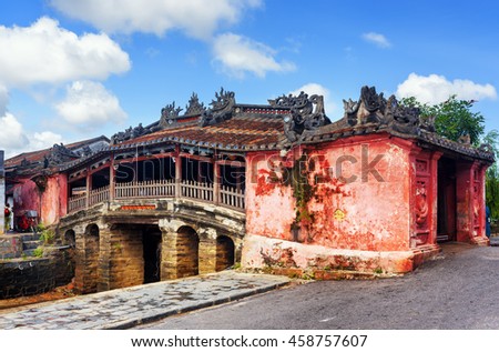 View of the Japanese Covered Bridge (Cau Chua Pagoda, Cau Nhat Ban, Lai Vien Kieu), Hoi An Ancient Town (Hoian), Vietnam. Blue sky in background. The old bridge is a popular tourist attraction of Asia