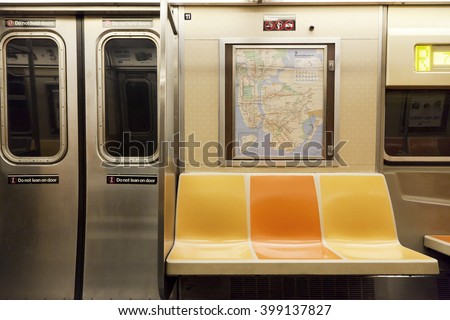New York, NY, USA - March 11, 2016: Inside of subway wagon: Colorful seats and inside of empty car: The NYC Subway is one of the oldest and most extensive public transportation systems in the world.