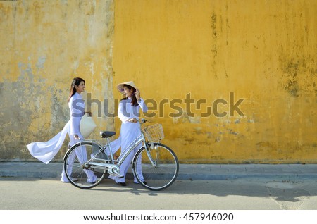 Beautiful woman with Vietnam culture traditional ,vintage style,Hoi an Vietnam