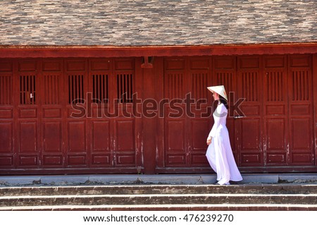Beautiful woman with Vietnam culture traditional dress,Ao dai is famous traditional costume ,vintage style,Vietnam