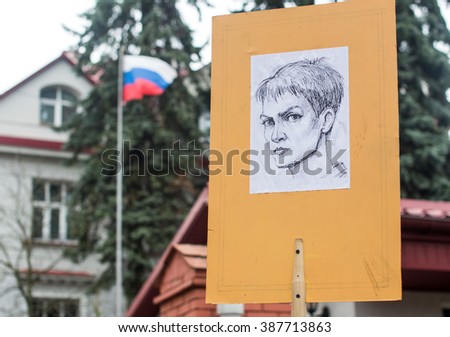 Lviv, Ukraine - Mar 08, 2016: Portrait of Nadiya Savchenko, Ukrainian politician and former military pilot imprisoned in Russia, being held in front of the Russian Consulate General by a protester.