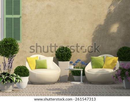 Cozy terrace in the garden with flowers