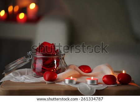 Champagne glasses and rose petals for celebrating Valentines Day