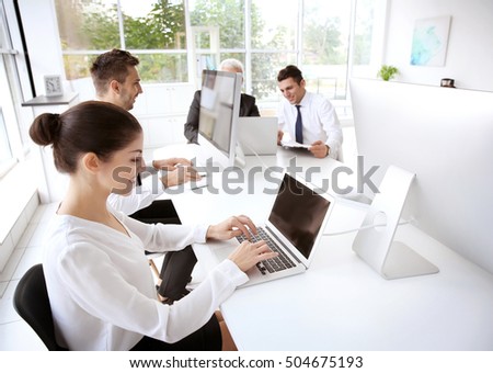 stock-photo-business-training-concept-colleagues-working-on-computers-at-office-504675193.jpg