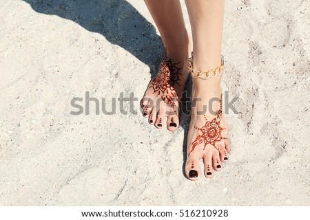 female legs henna tattoo on beach stock photo 516210865 shutterstock female legs henna tattoo on beach stock photo 516210865 shutterstock