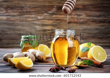 Natural ingredients for cough remedy on wooden table