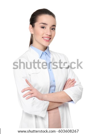 Young woman pharmacist with crossed arms on white background